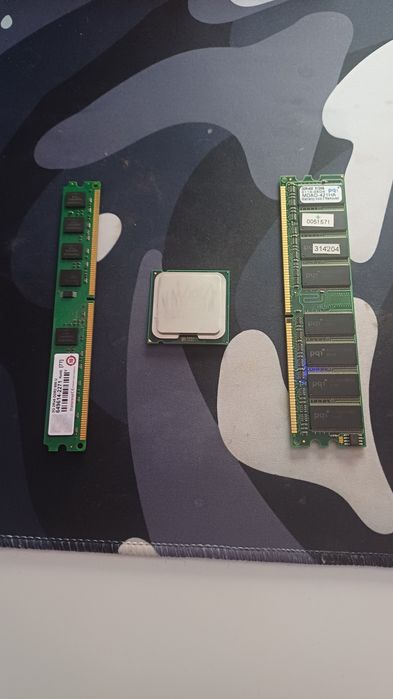 Процесор intel E 6500. Ram 2GB ,512 MB