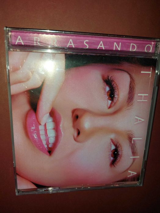 CD  Thelia Arrasando - original, RAR