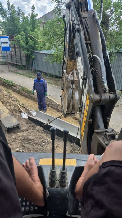 Услуги экскаватора погрузчика