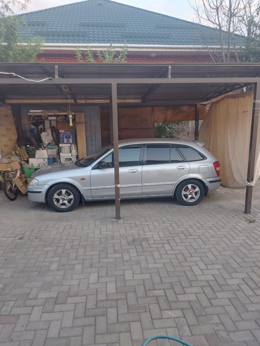 Продам машину Mazda 323