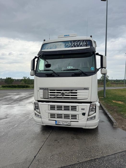 Ansamblu VOLVO 420 2013 și remorca Schmitz 2008