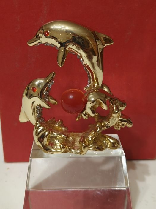 Продам статуэтку дельфинов