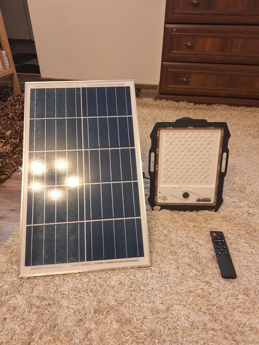 Vand Lampa solara  300 w cu panou . Camera