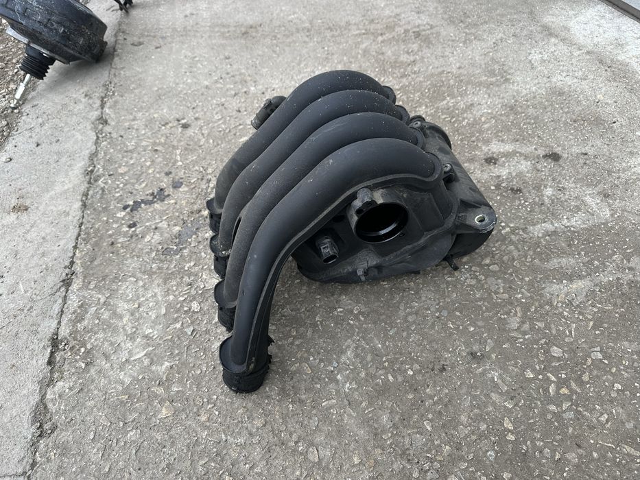 06B 133 210 BJ всмукателен колектор за Ауди А4 B7 2.0i