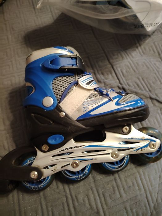 Коньки роликовые