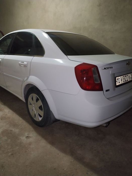 Lacetti 1.8 mator gaz bor holat yaxshi