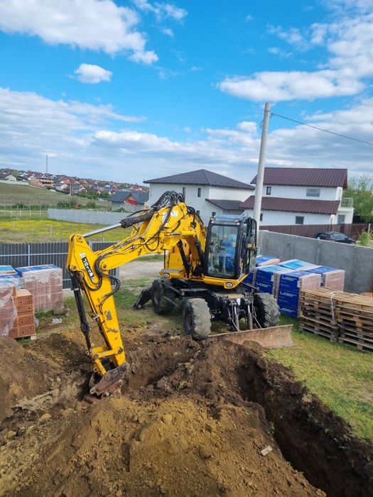 Închiriere excavator JCB JS145W (16t) + operator