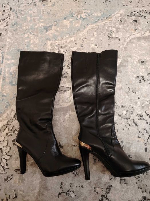 Продам кожаные сапоги