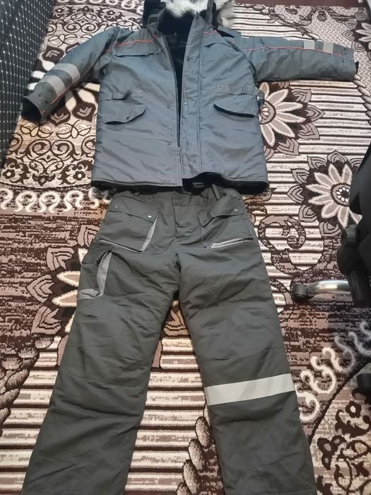 Продам зимний пуховик