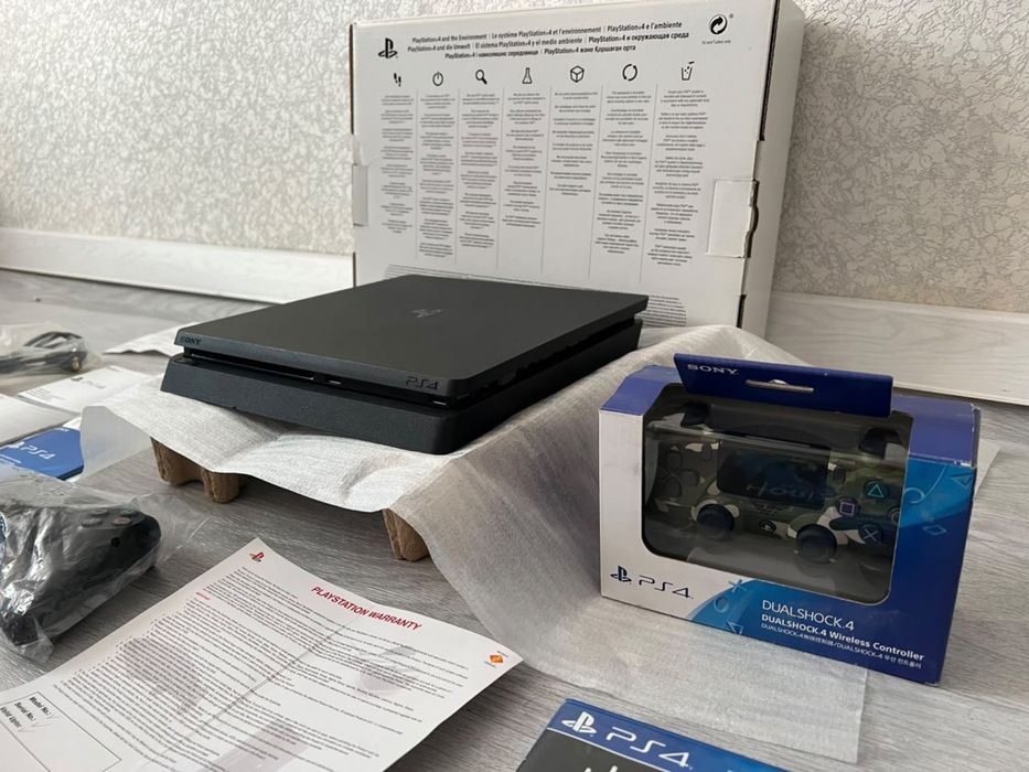 Продам новый playstation 4 slim box 1tb.