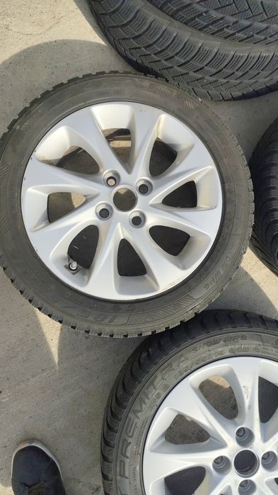 Jante aluminiu 4 X100 pe 15. Cu anvelope M+S . 185/55R15.
