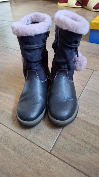 Ghete imblanite din piele