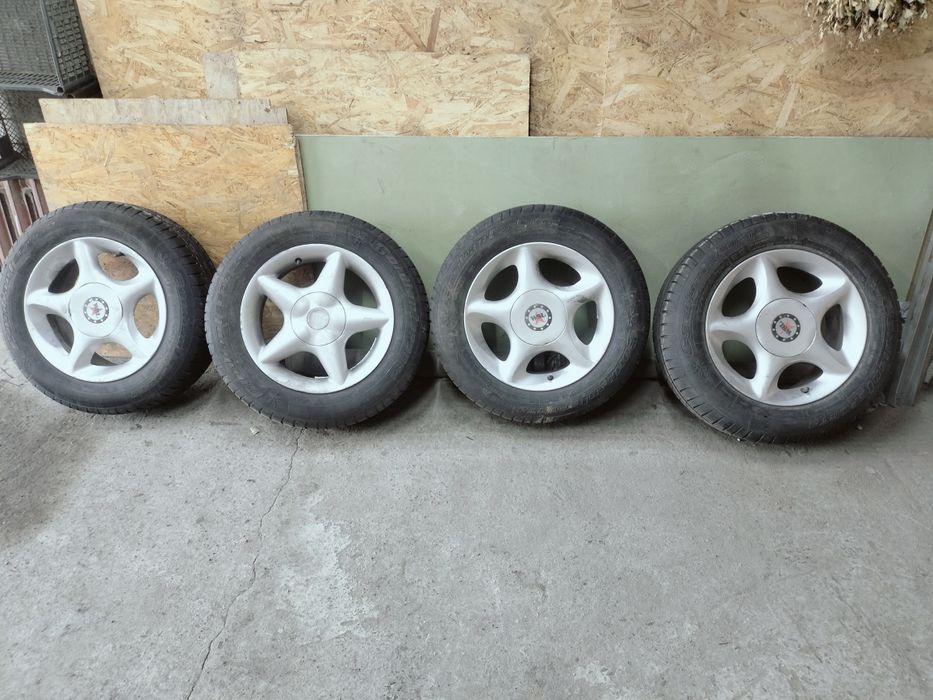 Продам диски литые с резиной Ауди