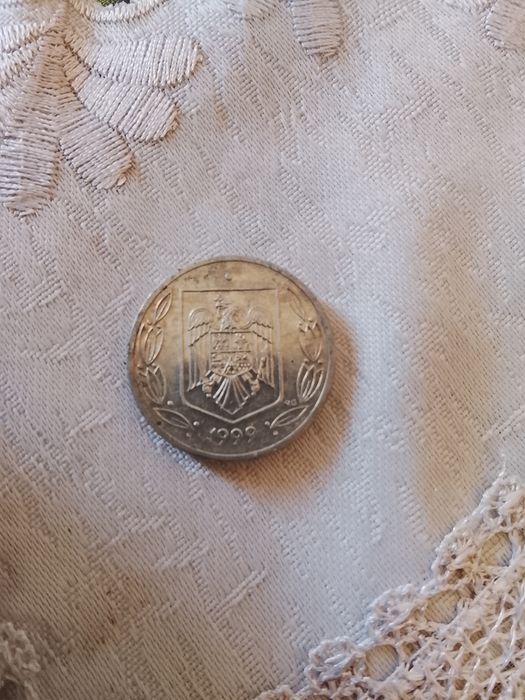 Vind moneda de 500 lei din 1999