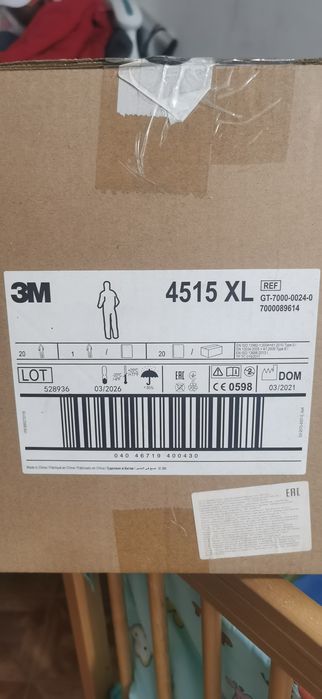 Защитные комбинезоны одноразовые 3М