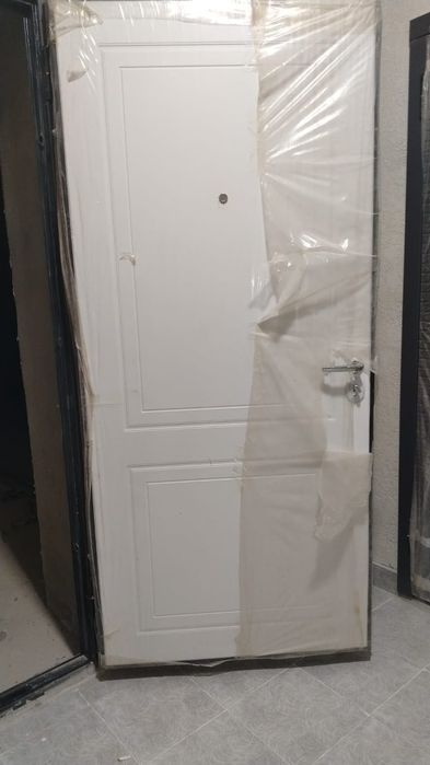 Сыртқы есік қаланың үй