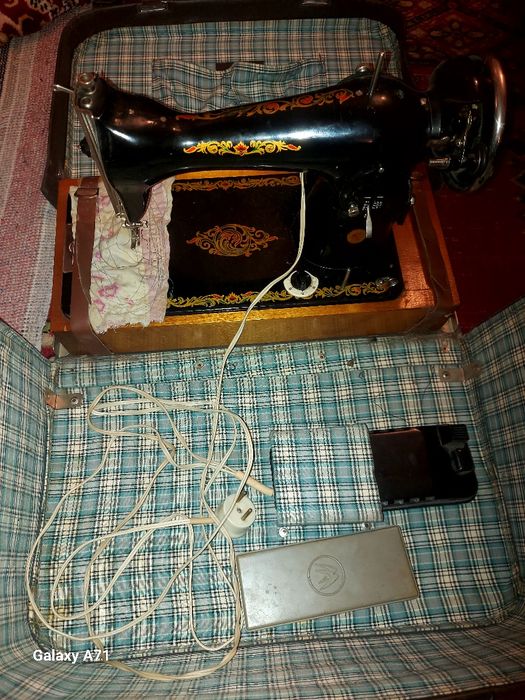 Masina de cusut Singer