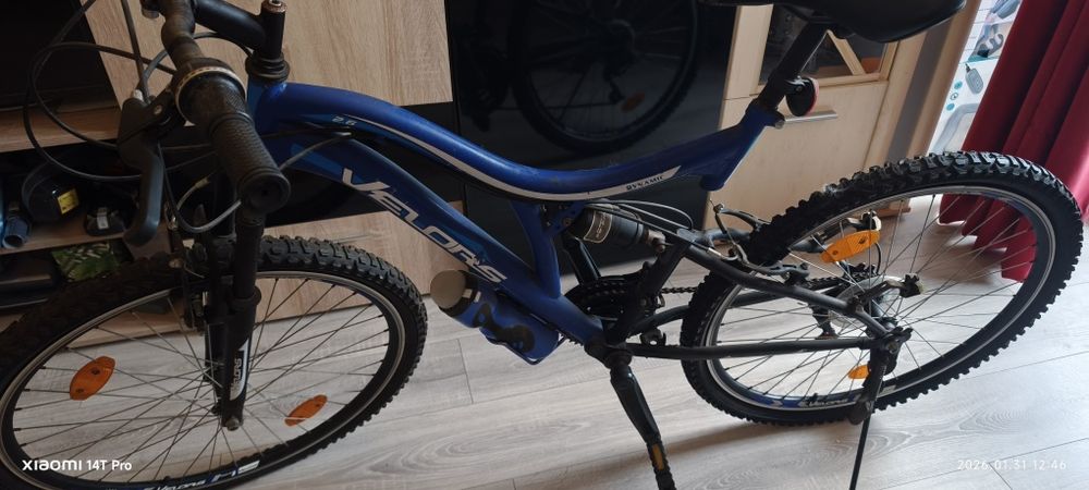 Bicicleta cu suspensii adulti