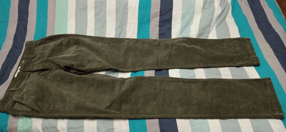 Pantaloni raiați Celio damă