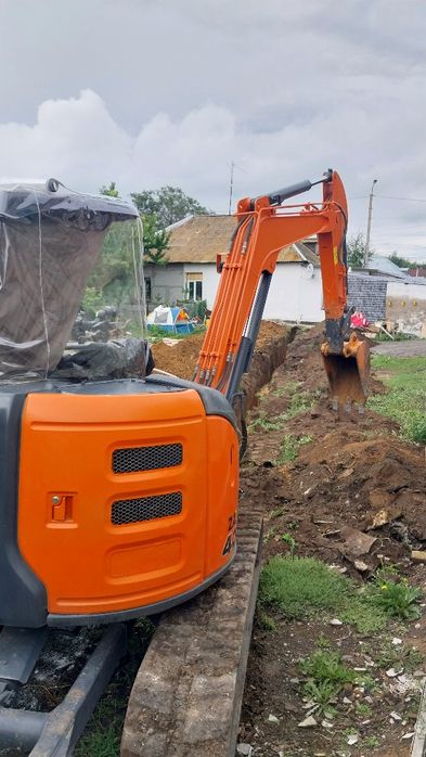 Блоха услуги мини экскаватор гидромолот. Ковш 70-40