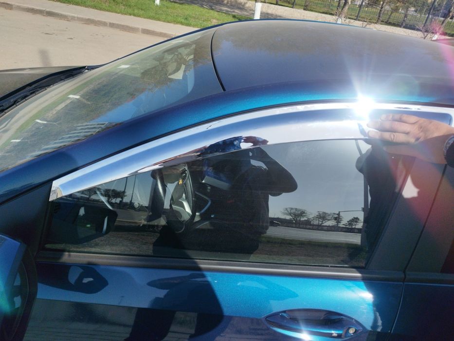 Дефлекторы (ветровики) Хром Onix