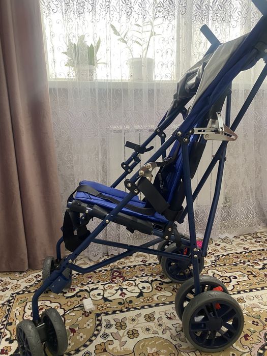 Детская  инвалидная  коляска