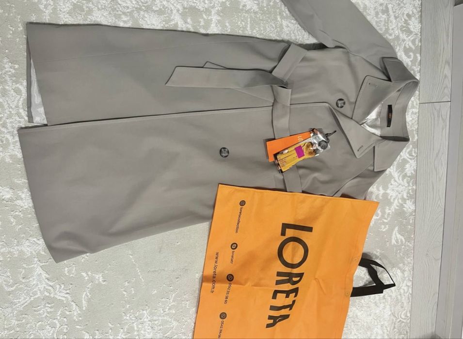 Продам  стильный тренч новый