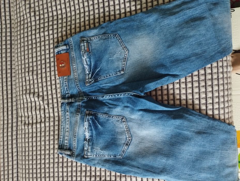 Продам новые  джинсы