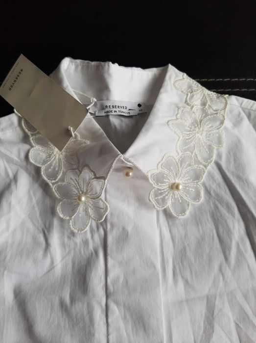 Нова риза на RESERVED