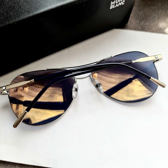 Солнцезащитные очки.