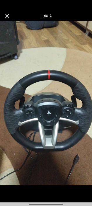 Vând PlayStation 4 și volan PlayStation + jocuri incluse