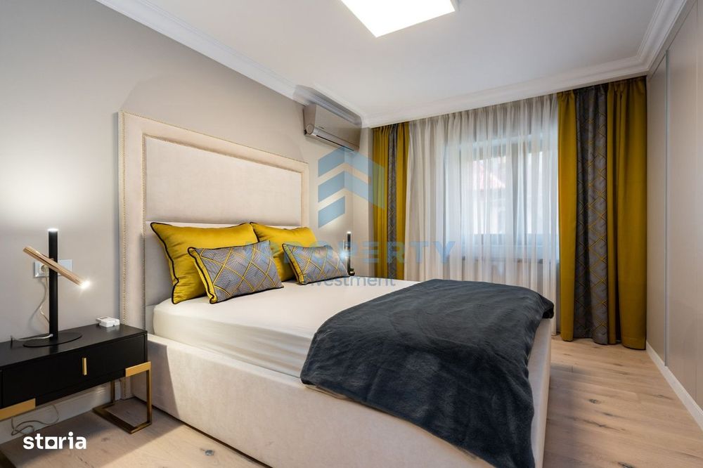Apartament cu 4 camere mobilat Designer zona Victoriei Guvern