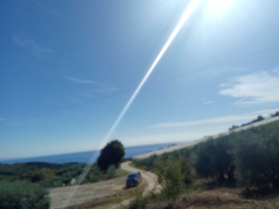 Парцел за къща в Лутра, 8 км. от Перамос, проект и РС- 55000 евро.