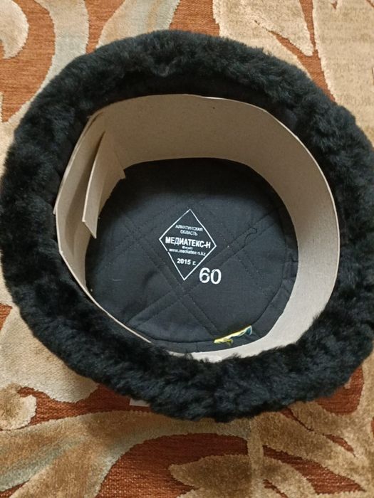 Меховая шапка ушанка