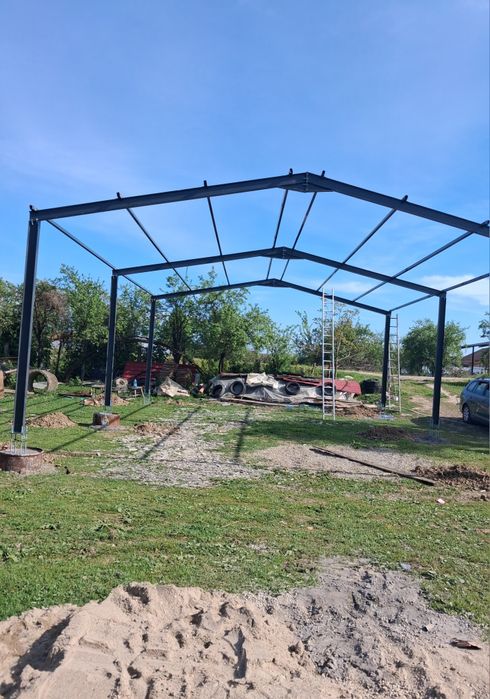 Vând structura metalică de 12 m x20 m x4 m cu montaj preț 5500€ vând structura metalică de 10 m x15 m x4 m preț 3700€ cu montaj vând structura metalic