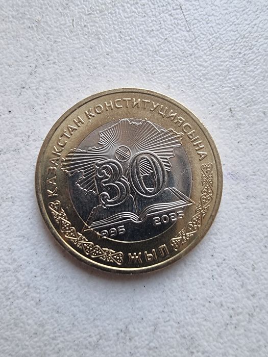 100 теңгенің  жаңа түрі