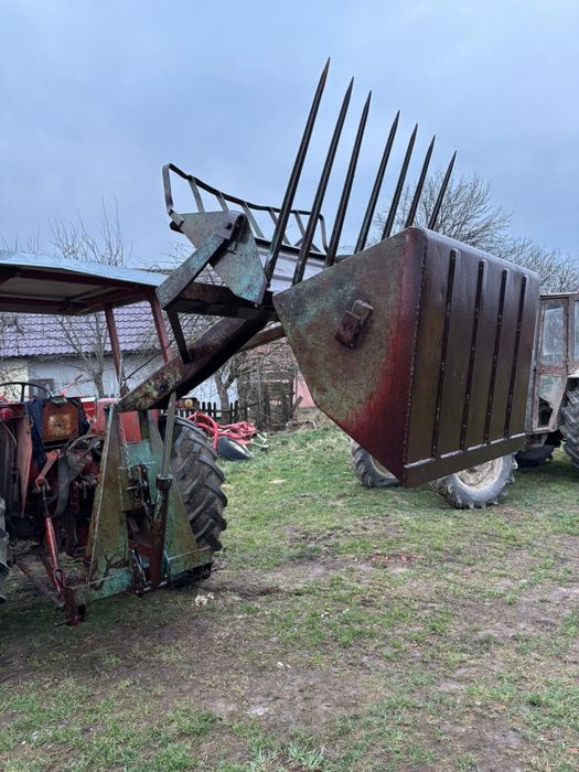 Încărcător în tirant