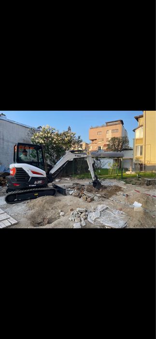 Inchiriem buldoexcavator