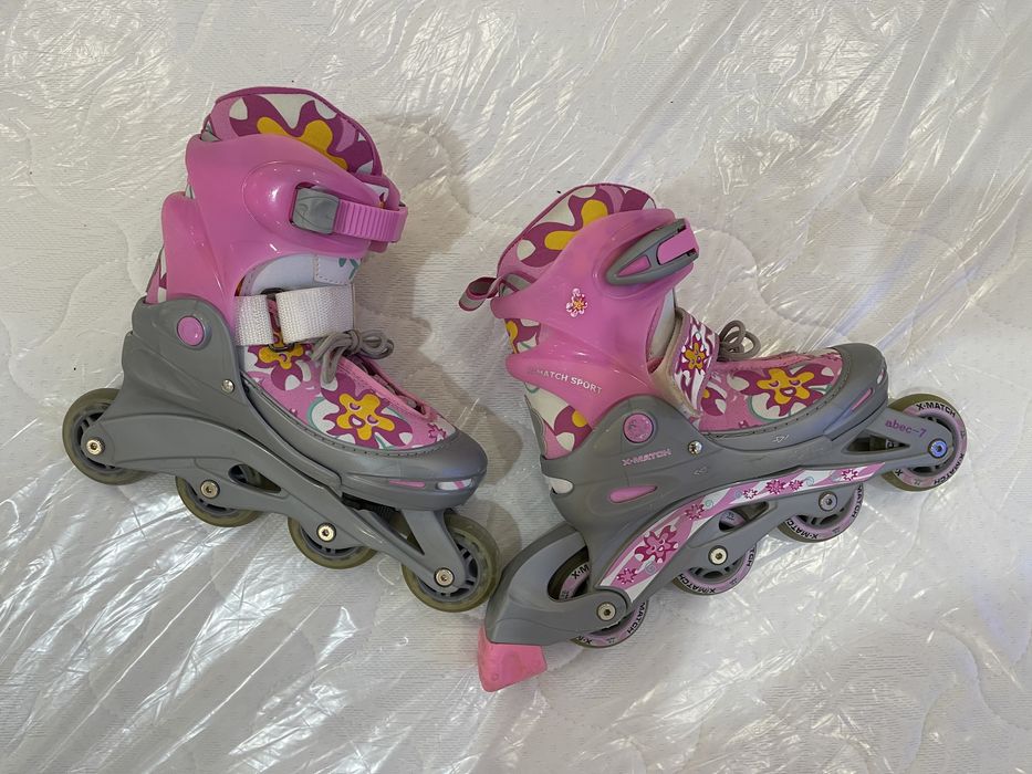 Роликовые коньки