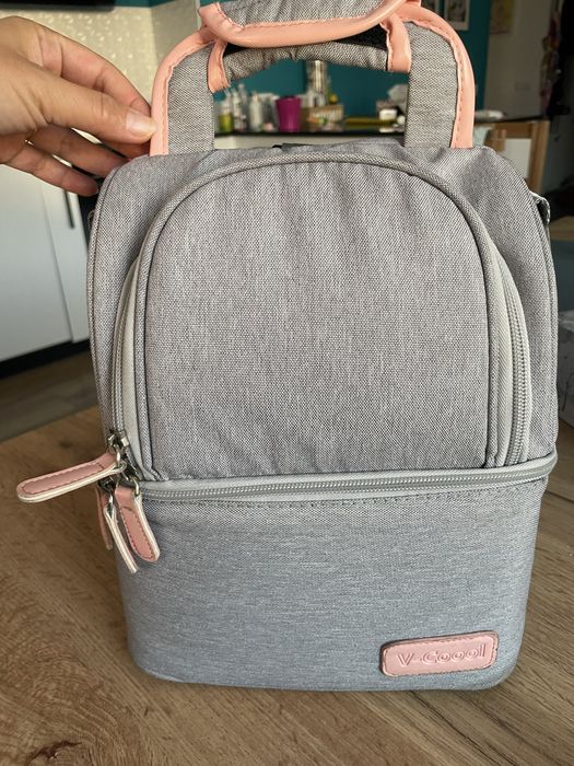 Чанта за бебешки принадлежности с подарък