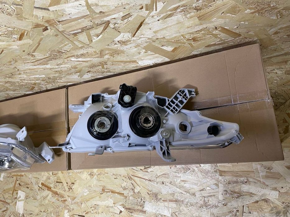 Фары с корректором на Хайландер 10-13