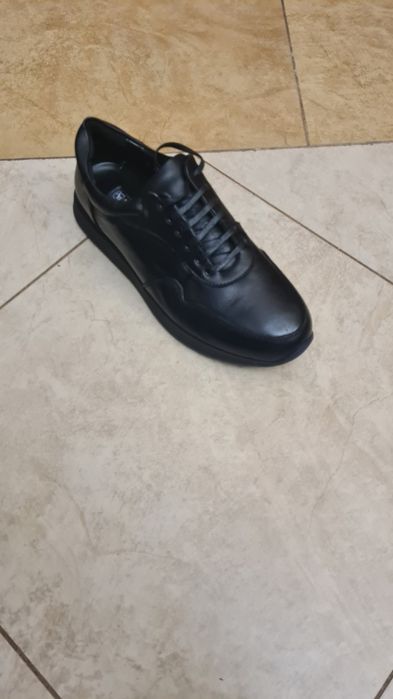 Кроссовки кожаные Албен,новые.