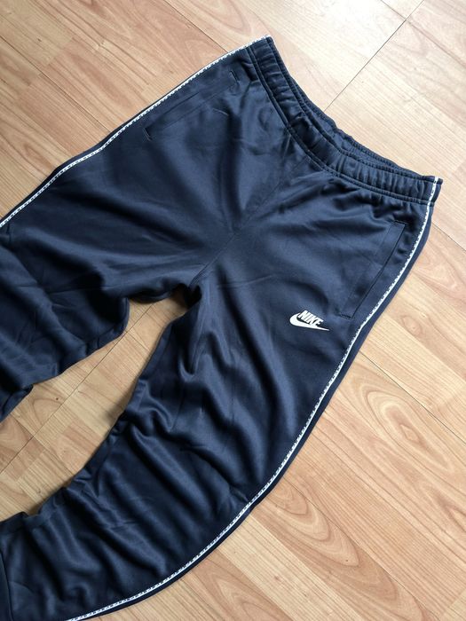 Pantaloni training pants joggers tapered leg Nike blue poliester