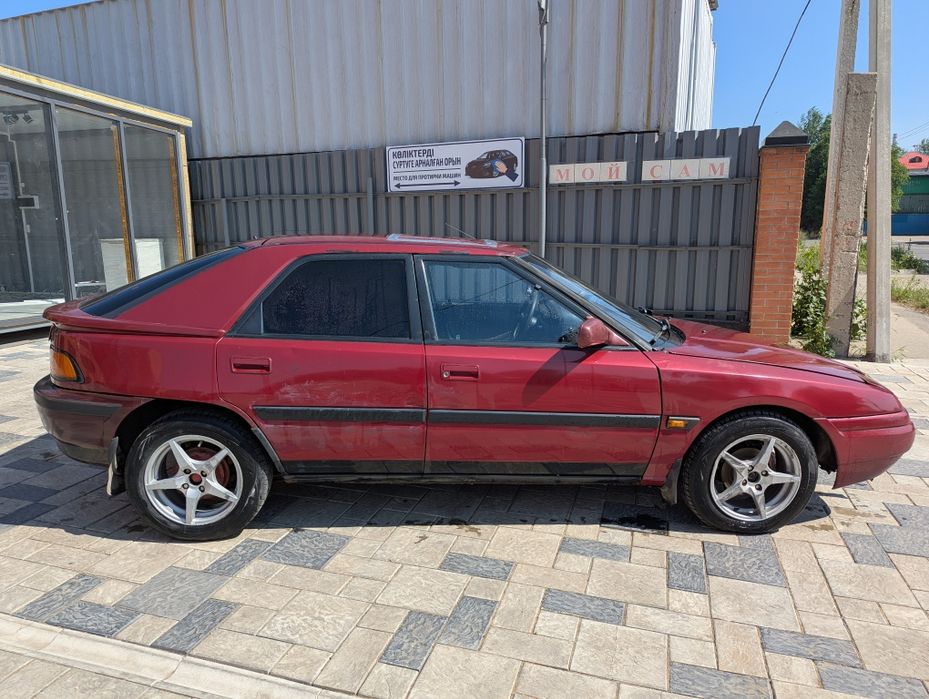 Mazda 323f bg слепая в отс