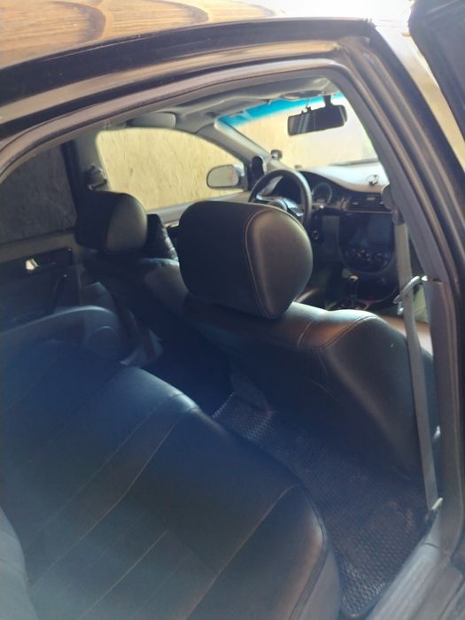 Lasetti 1.8 yili 2011 aftamat karopka