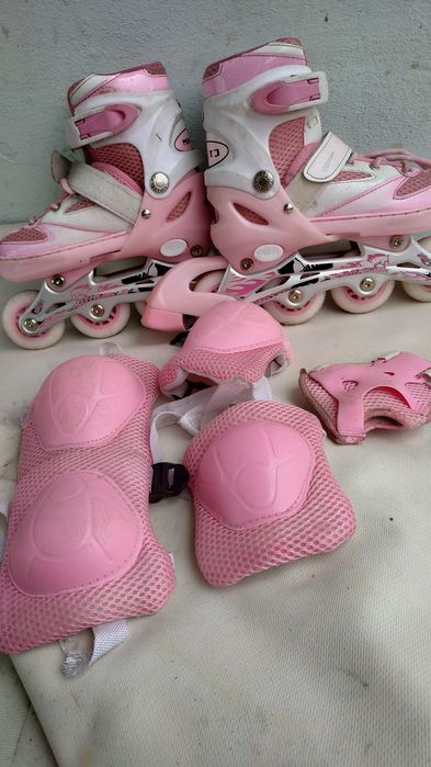 Роликовые коньки