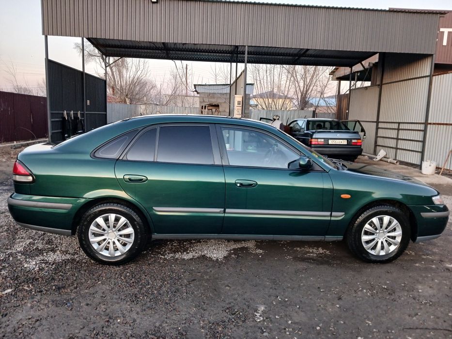 Mazda 626 птичка