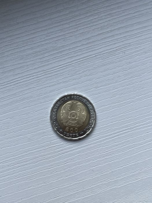 Продам монетку 200тг