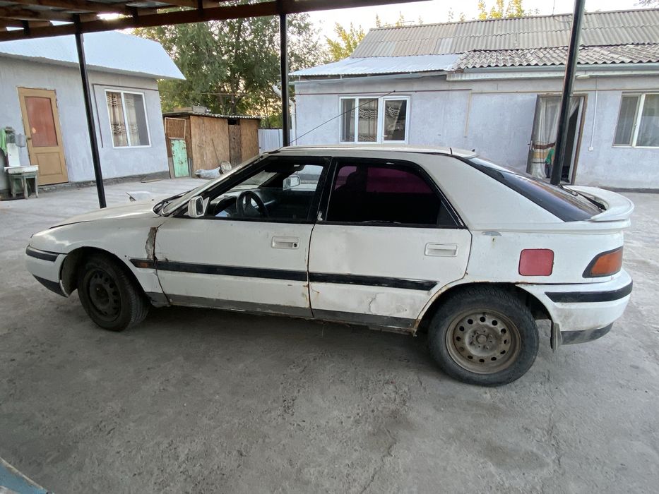 Мазда 323 f на ходу