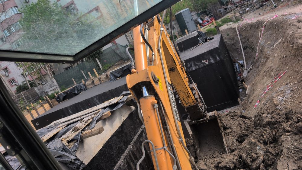 Buldoexcavator,sapaturi fose,fundatie,defrisari,demolari